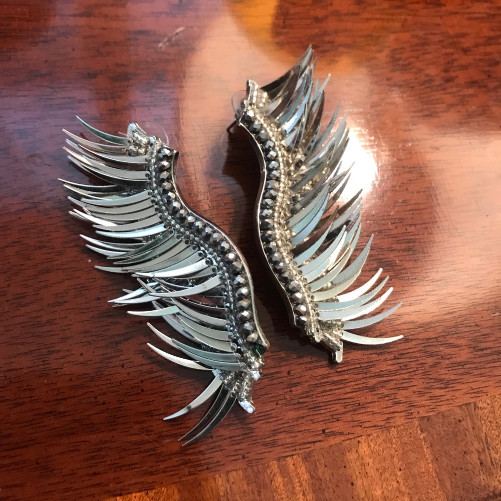 silver wing statement earrings